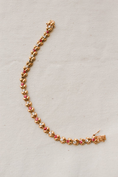 1980s Gold Pink Sapphire Tennis Bracelet