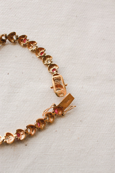 1980s Gold Pink Sapphire Tennis Bracelet